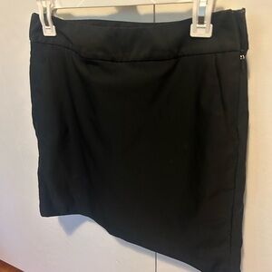 Nike golf skirt, side zip. Had built in shorts